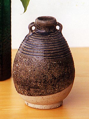 A blue glaze ceramic bottle vase with lug handles incised with concentric rings. - Sukhothai Antiques
