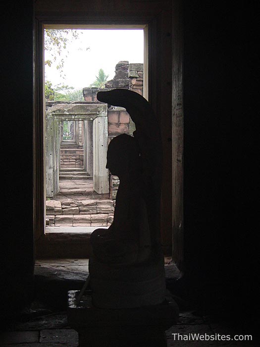 Buddha with Naga covering, inside Prasat Hin Phimai, Nakhon Ratchasima, Thailand.