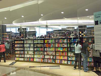 The Kinokuniya bookstore at Siam Paragon is huge and offers books in Thai