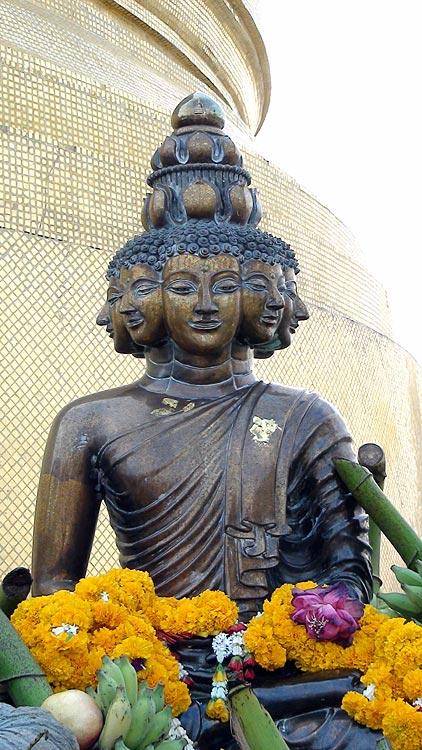 Multi-headed Buddha Image next to the Stupa