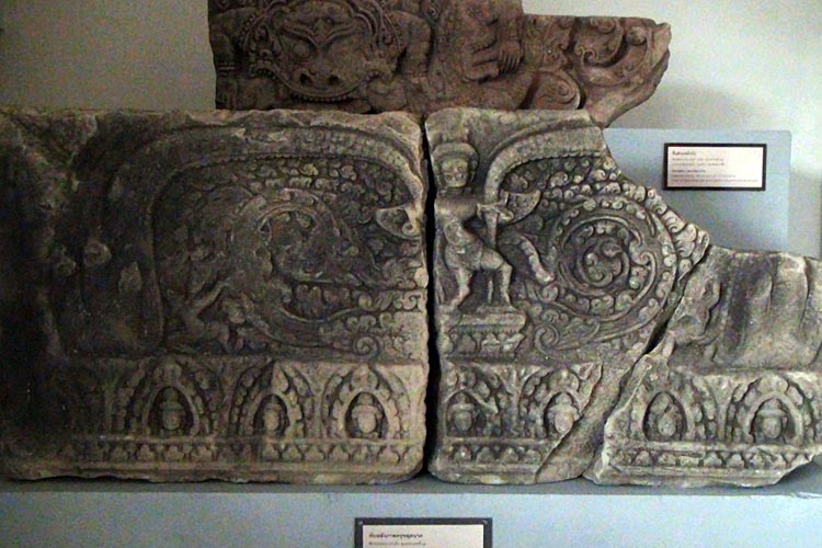 Garuda, holding two Nagas -