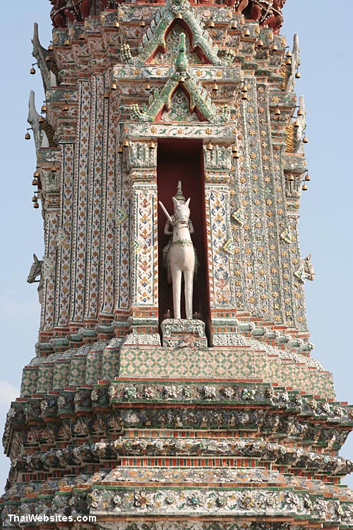 Phra Phai is located in 4 niches on each smaller Prang, Wat Arun