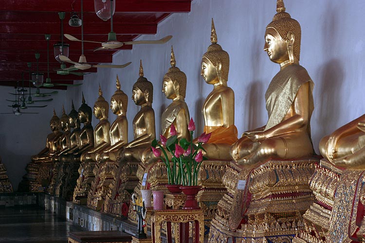 Gilded Buddha Images in the Gallery of Wat Mahathat