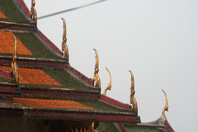 Chofahs on roof of Viharn, Wat Suthat
